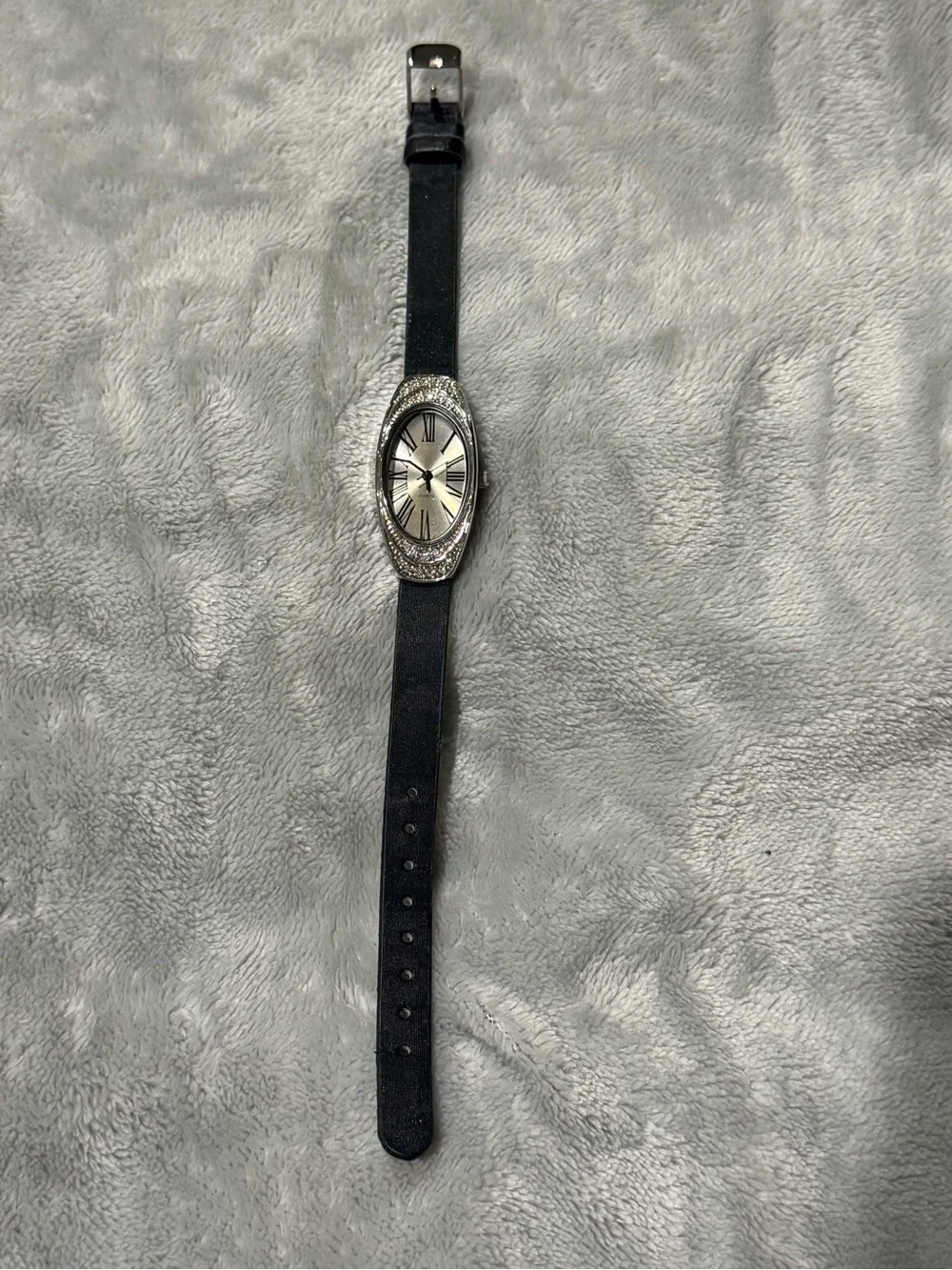 Slim Oval Silver Dial Watch with Black Strap